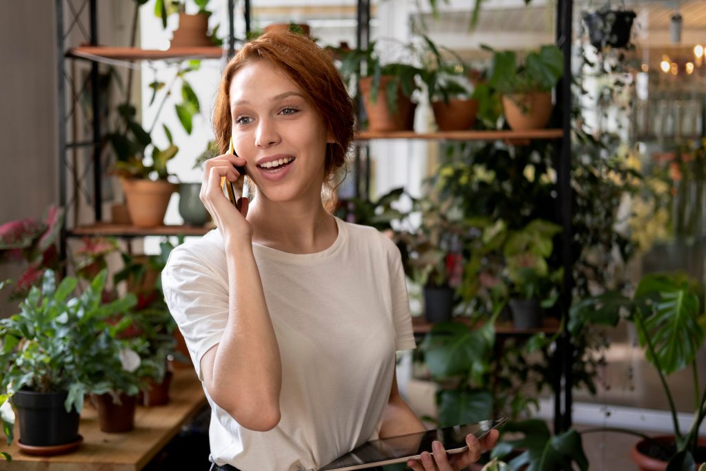 Woman talking on the phone smiling
